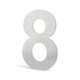 L'Animo en acier inoxydable 15 cm (sans perçage) de yessential.fr est un chiffre huit métallique avec une finition brossée, debout sur un fond blanc - idéal comme numéro de maison élégant en acier inoxydable pour votre maison.