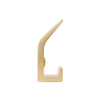 Le Huso Gold de yessential.fr est un crochet moderne et élégant de couleur dorée avec un design angulaire - présenté en vue latérale sur un fond blanc - idéal comme patère dorée élégante pour les intérieurs contemporains.