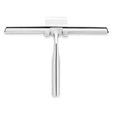 Le Zamoro Chrome de yessential.fr est doté d'une large lame en caoutchouc noir et d'un manche élégant en acier inoxydable, sur un fond blanc uni.