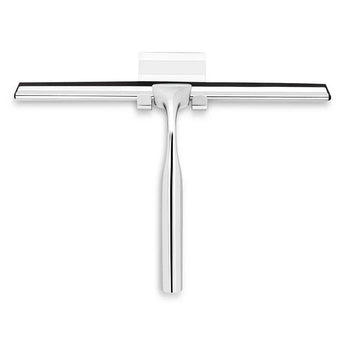 Le Zamoro Chrome de yessential.fr est doté d'une large lame en caoutchouc noir et d'un manche élégant en acier inoxydable, sur un fond blanc uni.