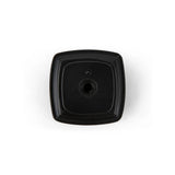 Un bouton carré noir Adaro Black de yessential.fr avec un trou central est présenté de dessus sur un fond blanc, soulignant le design moderne.