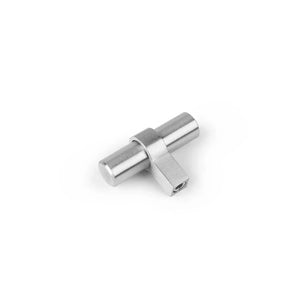 Le bouton Arturo en acier inoxydable de yessential.fr est un petit connecteur en forme de T en métal argenté avec un corps cylindrique et une extension rectangulaire perpendiculaire, représenté sur un fond blanc.
