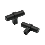 Deux boutons Arturo Black noir mat de yessential.fr, avec de courtes tiges rectangulaires, sont présentés sur un fond blanc - parfaits pour une cuisine moderne ou comme ferrures d'armoires élégantes.