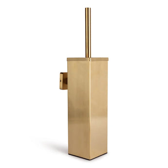 Le porte-brosse de toilette Alessino Gold de yessential.fr, avec brosse assortie, a un design minimaliste et ajoute une élégance élégante à n'importe quelle salle de bain.
