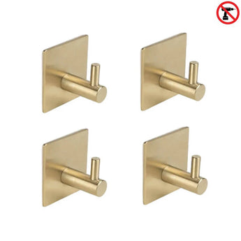 Quatre crochets muraux à base carrée yessential.fr 4x Navarro Gold sont disposés dans une grille. Une icône rouge sans perçage indique que ces crochets sont faciles à installer sans perçage – parfait crochet à serviette sans perçage pour votre espace.
