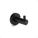 Le Justo Black Hook est un crochet à serviette en acier inoxydable noir mat avec une base cylindrique et une tige courte et horizontale - idéal comme crochet à serviette noir pour votre salle de bain.
