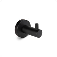 Le Justo Black Hook est un crochet à serviette en acier inoxydable noir mat avec une base cylindrique et une tige courte et horizontale - idéal comme crochet à serviette noir pour votre salle de bain.