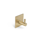 L'ensemble WC Lazzo Gold (sans perçage) de yessential.fr comprend un crochet mural moderne en laiton avec une plaque arrière carrée et une cheville cylindrique - parfait pour les accessoires de salle de bain ou de toilettes, représenté sur un fond blanc uni.