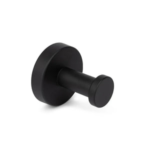 Le crochet noir Kyano de yessential.fr avec une finition noire finale avec une base ronde et une broche cylindrique, idéal pour la salle de bain, représenté sur fond blanc uni.