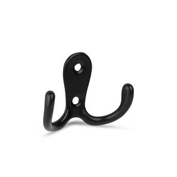 La patère Pagano Black de yessential.fr possède deux bras courbés et deux trous de vis pour le montage. Vu sur un fond blanc.