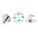 L'ensemble WC Juano Chrome (sans perçage) de yessential.fr est présenté : trois crochets métalliques ronds, deux avec une finition argent brillant et un avec le support adhésif 3M PE FOAM, le tout disposé sur un fond blanc. Aucun perçage n'est requis pour l'installation.