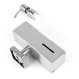 La Sonego Stainless Steel de yessential.fr est une élégante pompe à savon en acier inoxydable avec mécanisme de pompe, montage mural et petite fenêtre de visualisation. Le modèle rectangulaire repose sur un fond blanc.