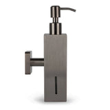 Le Sonego Gunmetal de yessential.fr est un distributeur de savon mural moderne avec un corps rectangulaire, un dessus de pompe, une fenêtre de niveau de savon verticale et une finition en métal brossé pour un look élégant.
