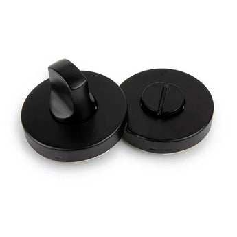 Le support WC yessential.fr Rodi Black - un service pour le rond noir avec un tour de rotation et un service pour le WC et une partie inoxydable pour les pièces de la monnaie du tournevis - sont présentés sur un fond blanc.