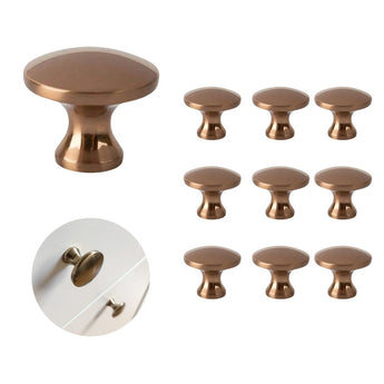 Un ensemble de boutons de porte en bronze d'aspect rond.