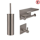 L'ensemble WC Tapio Gunmetal (sans perçage) de yessential.fr se compose d'un ensemble brosse WC, d'un porte-papier toilette avec étagère et crochet mural. Il y a un symbole d'interdiction de perçage dans le coin supérieur droit.