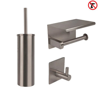 L'ensemble WC Tapio Gunmetal (sans perçage) de yessential.fr se compose d'un ensemble brosse WC, d'un porte-papier toilette avec étagère et crochet mural. Il y a un symbole d'interdiction de perçage dans le coin supérieur droit.
