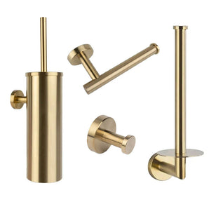 L'ensemble WC Cosimo Gold de yessential.fr est un ensemble d'accessoires de salle de bain moderne et minimaliste composé de quatre éléments de couleur dorée : un porte-brosse de toilette, un porte-rouleau de papier toilette, un crochet mural simple et un porte-rouleau de rechange sur fond blanc.