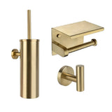 L'ensemble de toilettes Nando Gold de yessential.fr se compose d'un porte-brosse de toilette mural, d'un porte-papier toilette avec étagère et d'un crochet mural rond - un ensemble d'accessoires de salle de bain élégant pour un look moderne.
