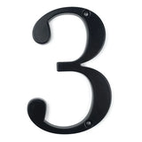 Le Matteo Black 10cm de yessential.fr est un numéro de maison noir "3" en lettres serif, avec deux trous de fixation (en haut à droite, en bas à gauche) sur fond blanc - idéal pour l'adresse de votre maison.