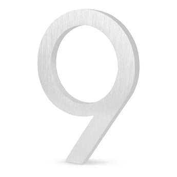 Le Milano Stainless Steel 15cm est un numéro neuf en acier inoxydable avec une finition brossée, debout sur un fond blanc - idéal comme numéro de maison moderne pour toute maison contemporaine.
