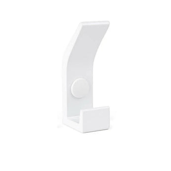 La patère Huso White de yessential.fr présente un design blanc minimaliste avec une base rectangulaire, une courbe douce et un point de fixation rond central, sur un fond blanc uni.
