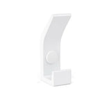 La patère Huso White de yessential.fr présente un design blanc minimaliste avec une base rectangulaire, une courbe douce et un point de fixation rond central, sur un fond blanc uni.