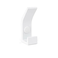 La patère Huso White de yessential.fr présente un design blanc minimaliste avec une base rectangulaire, une courbe douce et un point de fixation rond central, sur un fond blanc uni.