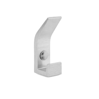 La patère Huso en acier inoxydable de yessential.fr présente un design moderne avec une base rectangulaire et un dessus incliné, sur un fond blanc uni.