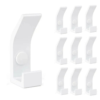 Le 10x Huso White de yessential.fr comporte dix patères blanches identiques dans un style moderne et minimaliste - idéal pour un intérieur scandinave. À gauche, une parenthèse est détaillée, à droite, neuf parenthèses dans une grille.