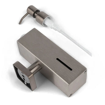La pompe à savon Sonego Gunmetal de yessential.fr, avec corps rectangulaire et mécanisme de pompe séparé, est présentée sur fond blanc.