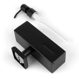 Un design rectangulaire noir élégant avec une pompe séparée et une fente pour vérifier le niveau de savon, le distributeur de savon Sonego Black de yessential.fr allie style moderne et fonctionnalité. Représenté sur un fond blanc.