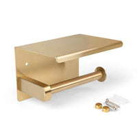 Le porte-rouleau de papier toilette Tazio Gold avec étagère et dessus plat de yessential.fr, fourni avec le matériel de montage, est présenté sur fond blanc.