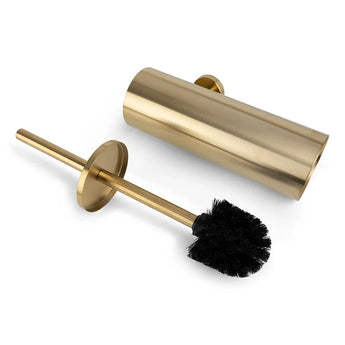 L'ensemble de toilette Romano Gold de yessential.fr est un ensemble d'accessoires de toilette de couleur dorée avec un support cylindrique qui se trouve sur le côté, à côté de la brosse à tête de brosse noire.