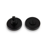 Deux serrures WC rondes en métal noir Rodi Black de yessential.fr - une avec un bouton rotatif, une avec une fente plate - sont représentées sur un fond blanc. Parfait comme serrure de toilette noire mate élégante pour votre porte.
