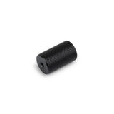 Le bouton Remo Black Deluxe de yessential.fr, une poignée cylindrique moderne avec une texture moletée et un trou central, est présenté sur un fond blanc - idéal comme bouton d'armoire contemporain élégant.